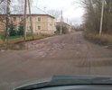 Огромные ямы. Лужи. Асфальт местами погребен под слоем грязь. К автобусной остановке не подойти. Выезд на улицу Транспортную из-за огромной и глубоко ямы на повороте возможен только со встречного направления.