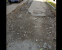 Участок улицы Циолковского в исторической части города Феодосии находится в плачевном состоянии: асфальтовое покрытие практически разрушено, а в период дождей данный участок улицы продолжительное время остается затопленным, и больших ям практически не видно. Следует отметить, что данный участок улицы Циолковского является единственным связующим звеном между улицами Чехова и Адмиральский бульвар (для выезда на последний), в связи с организацией одностороннего движения на улице Чехова. Также по этому участку улицы Циолковского ежедневно движутся тяжелые мусоровозы, окончательно разрушая и без того ужасное дорожное покрытие. Кроме того, в период затопления, заблокирован беспрепятственный выезд в центр города с нескольких улиц, находящихся справа от улицы Чехова, по ходу одностороннего движения. Неоднократные обращения в Администрацию города с просьбой отремонтировать этот небольшой участок улицы остались без внимания. Просим проверить указанную информацию и повлиять на скорейшее принятие решения о ремонте данного участка улицы Циолковского.