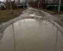 Это тоже дорога по которой ездит транспорт и ходят люди по улице Заводская,дома №1-№27. Очень просим проложить асфальт.