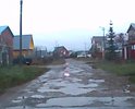 Надоели эти калдобины!!!
Когда же у нас будут нормальные асфальтированные дороги!
Администрация города вообще не думает о частном секторе. 
Только своими стараниями сами жильцы хоть как-то поддерживают дорогу (за свои деньги) более-менее для проезда.