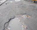 Здравствуйте! г.Советск,ул.Жилинское шоссе 3А, пожалуйста обратите внимание, проезжая часть не ремонтировалась лет 15, овраг на овраге, на фото плохо видно из за луж, но состояние дороги плохое.Надеемся, что на этот раз мы попадем в программу ремонта дорог, (т.к. нашу улицу всегда игнорируют и никогда не включают в план ремонта)Люди сами засыпают периодически эти ямы. С уважением жители этого дома.