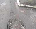 Здравствуйте! г.Советск,ул.Жилинское шоссе 3А, пожалуйста обратите внимание, проезжая часть не ремонтировалась лет 15, овраг на овраге, на фото плохо видно из за луж, но состояние дороги плохое.Надеемся, что на этот раз мы попадем в программу ремонта дорог, (т.к. нашу улицу всегда игнорируют и никогда не включают в план ремонта)Люди сами засыпают периодически эти ямы. С уважением жители этого дома.