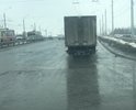 Асфальт на мосту, в сторону московского шоссе в огромных ямах