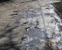 Вся улица первомайская в большом количестве ям.