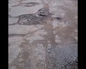 Путилово.Дорога вся убита, торчит арматура