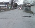 ул.Западная на пересечении с ул.Главной и ул.Пешеходной вся в выбоинах и ямах. По ней проходит городской транспорт, дорога ведет к храму.