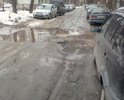 Полное разрушение дорожного полотна между улицами Пионерской и Сосновой, огромная яма.