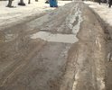 Ямы по всей улице, есть как и небольшие так огромные ямы.