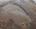 Асфальт в селе положили в начале 90-х годов прошлого века и больше об этой дороге никто не вспоминал. Дорога расположена в селе Устье Тотемского района Вологодской области. А в самом селе находится знаменитейший на всю область храм - Покрова Пресвятой Богородицы. Знаменит он тем, что не закрывался никогда. В самом храме имеется уникальный иконостас конца ХV111 века и два мраморных иконостаса в двух церковных пределах. В связи с чем, село (официально почему-то - деревня) посещается и паломниками и туристами. О дорожной проблеме можно сказать ещё больше - к селу ведет грунтовая дорога, длиной 18 километров. Это не дорога - это большая катастрофа.