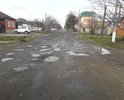 Участок дороги по ул. Калинина от ул. Кубанской и до ул. Гагарина находится просто в безобразном состоянии. Убитая дорога!!!