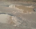 После полного таянья снега, вся улица с ямами и огромной лужей в близи перекрёстка с улицей Пионерской, также между Пионерской и Сосновой улицей огромная яма на всю дорогу, водители! будьте аккуратнее на этой дороге.