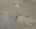 После полного таянья снега, вся улица с ямами и огромной лужей в близи перекрёстка с улицей Пионерской, также между Пионерской и Сосновой улицей огромная яма на всю дорогу, водители! будьте аккуратнее на этой дороге.