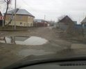 Проезд от Красноармейской к Юбилейной. Весь разбит, засыпан каким то мусором, сплошные ямы.