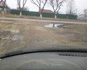 Проезд от красноармейской к юбилейному переулку, весь разбит, нет даже съезда с асфальта, сам проезд отсыпан строительным мусором, сплошные ямы