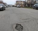 Черкесск, от улицы Космонавтов 60А до съезда на Октябрьскую. Это участок перед институтом СКГГТА. Очень плохая дорога. Необходим ремонт.