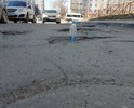 Очень ужасная дорога по адресу г. Ульяновск, пр. Врача Сурова д. 20. Огромные ямы.