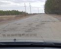 С весны были огромные ямы, сейчас самые плохие заделали, но всё ещё требуется хотя бы ямочный ремонт. В идеале полная замена