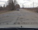 С весны были огромные ямы, сейчас самые плохие заделали, но всё ещё требуется хотя бы ямочный ремонт. В идеале полная замена