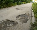 Дворовая дорога на улице Северодонецкая, г. Новомосковск находится в ужасном состоянии. Более 15 лет не производился ремонт дорожного покрытия. Трудно проехать к дому при этом не зацепиться защитой двигателя. Проезд к дому приносит материальные убытки в плане ремонта бамперов автомобиля. Обращения в администрацию никак не помогли, приходили лишь отписки о том, что ремонт производиться не будет.