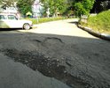 Дворовая дорога на улице Северодонецкая, г. Новомосковск находится в ужасном состоянии. Более 15 лет не производился ремонт дорожного покрытия. Трудно проехать к дому при этом не зацепиться защитой двигателя. Проезд к дому приносит материальные убытки в плане ремонта бамперов автомобиля. Обращения в администрацию никак не помогли, приходили лишь отписки о том, что ремонт производиться не будет.