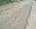 Данный участок дороги принадлежит институту им.Лобачевского, а он не занимается ремонтом дорог.
Дорога в крайне плачевном состоянии.