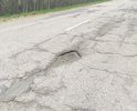 Многочисленные повреждения дорожного полотна, на протяжении 9.6 км, от д.Гайново до д.Жилино.