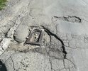 Огромная яма не делается годами. Рядом федеральная трасса, с которой фуры разбивают. Это просто жесть. Сегодня у моей машини просто колесо оторвало. Ступицу просто вырвало.