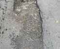 Дорога на переулке Кущевский Ростов на Дону начиная от Портовой вся в ямах разных размеров. Ни проехать не пойти. Некоторые ямы засыпали сами, но дождь вымывает . Хотелось бы полноценного ремонта дороги.