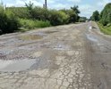 Ямы и выбоины на дороге начиная от перекрестка Новоникольское шоссе - ул 8 Марта и далее по ул. 8 Марта