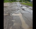 Сделал много фото. Все прикрепил. Дорога в таком состоянии уже не первый год. Льют дожди - дорогу поливают ежедневно. Ямы засыпали несколько раз щебнем и первый же дождь все размывал. Легковые машины бьют бампера, когда ям не видно из-за луж. Вся дорога такая вплоть до конца улицы интернациональной. Во дворе тоже беда. Буду очень рад, если посодействуете. Народ будет очень благодарен. Пока фотографировал дорогу, люди останавливались и поддерживали инициативу.