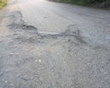 Дорога находится в ужаснейшем состоянии, ремонт никогда еще не проводился, в некоторых местах ямы достигают 20 сантиметров, а в среднем 10-15. Прошу обратить внимание на данный участок так как езда на данном участке очень затруднительна из-за большого количества ям.