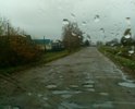 Так выглядит  дорога с а/б покрытием, после того как песок и гравий из смеси, которой её засыпали лет 12 назад чтобы прикрыть выбоины, снесло с помощью природы и человека на обочины. Последние два года процесс разрушения полотна ускорился и теперь это  езда с препятствиями.  В сухую погоду деревня задыхается от пыли, а зимой в сильные морозы дорога превращается в каток, так как посыпать песчано-солевой смесью нельзя, для дороги лучше чтобы она была в "ледовом панцире" объясняют дорожные службы.