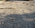 Дорога старая - участок не ремонтировался никогда. проезжают мимо машины - отлетают камни из-под колёс - бьют по стёклам и автомобилям. Проблема в дождь - камни с нашего участка - смывает на отремонтированную улицу Комсомольская - как следствие новая дорога резко дряхлеет.