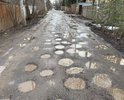Улица Книжная, микрорайон Болшево, город-наукоград (!!!) Королев.
Улица не ремонтировалась с советский времён. Жители обращались в местную администрацию несчетное количество раз, просили и даже голосовали через Добродел - бесполезно. Пишут отписки, что дорога третьей категории, асфальт не положен. Периодически ровняют грейдером, но этого хватает до первого дождя (а мы живем не в африканской пустыне).
При этом по габаритам дорога не то что третьей категории, она даже на пятую не тянет - ширина единственной полосы 3,0-3,5 метра, не дорога, а улочка. Зато по интенсивности движения, особенно летом - почти автомагистраль, так как используется транзитным транспортом для объезда пробки на основном шоссе.