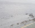 На участке ул. Маршака образовальсь выбоины и деформации дорожного покрытия; на правой полосе (по направлению к пл. Маршака, к/т Спартак) асфальт продавлен, образовалась колея.