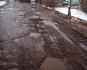 Проезд по данному участку опасен для жизни как водителей так и пешеходов.Глубина выбоин такова что большегрузы передвигаются со скоростью 3 КМ/час.Данный участок преодолеваю 3 раза в сутки.Ремонт подвески второй за два месяца.