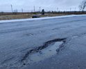 Автодорога Красное Село - Виллози - Гатчина. Участок Красное Село - Виллози ранее был по документам на территории Ленинградской области и обслуживался по заказу Администрации ЛО. Сейчас дорога передаётся Администрации Санкт-Петербурга, так как фактически находится на его территории. Передаётся уже больше года. А пока - участок бесхозный и денег на его ремонт выделить никто не может