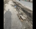 Неудовлетворительное состояние тротуара по улице Ленина . На самой дороге имеются выбоины и колейность