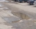 Глубокие ямы на проезжей части. Положите пожалуйста асфальт.