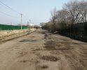 Большегрузные автомобили, которые ездят на ГОРТОП и ГОРГАЗ, разбили всю дорогу.