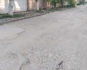 На участке ул.Первушина от перекрестка с ул.Степаняна до перекрестка с ул.Речной большое количество ям, глубиной достигающих 12см, которые полностью покрывают ширину проезжей части.
