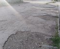 На участке ул.Первушина от перекрестка с ул.Степаняна до перекрестка с ул.Речной большое количество ям, глубиной достигающих 12см, которые полностью покрывают ширину проезжей части.