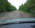 Дорожное покрытие полностью уничтожено требуется капитальный ремонт. Ежедневно по дороге проезжает более 500 автомобилей. В данном направлении еще установлено 2 камеры на скорость.