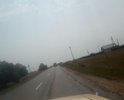 Посёлок Дулан. Местами мелкие заплатки, асфальт похоже в один слой края крошатся, на третьем фото напротив дорога промялась колиёй.