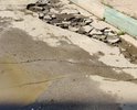 Нам сделали такой вот "ремонт" дороги ДВОРНИК из нашей УК. После дождя часть камней рассыпалась. Пройти/проехать очень тяжело. Помогите нам сделать пожалуйста ремонт дороги! А не колхозно засыпать ямы старым асфальтом!!!