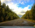 Многочисленные ямы на 93-94 км трассы Ухта - Вуктыл