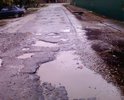 Обращались в администрацию города в прошлом году, обращались в этом году уже трижды. Ответ один - финансовые средства для ремонта переулка в бюджет не заложены, если будут в следующем году, то ... Просили сделать хоть ямочный ремонт, тоже отказали.