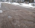 Требуется срочный ремонт дороги, ездить невозможно!!! Размеры ям превышают нормы в несколько раз. По  этой улице проходит большой поток грузового транспорта, отсюда и результат.