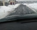 Асфальт сошел вместе со снегом. Проблема в том, что плохое дорожное основание, а так же нет водостока.