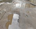 Здравствуйте! Прошу обратить внимание на состояние дорог и тротуаров в городе Остров-3 (квартал 3 Остров, г. Остров, Островский р-н, Псковская обл.) Дорога, в частности у дома №8, находится в очень плохом, ненадлежащем и разбитом состоянии. Сплошные глубокие ямы, колдобины. Дорога состоит из грязи, остатков щебня и крошек асфальта. Асфальтное покрытие практически полностью разрушено, что не соответствует нормам и создаёт угрозу водителям и пешеходам. Ямы просто невозможно объехать или обойти. Грейдер тут не поможет, он только усугубит ситуацию. Дорога не ремонтировалась несколько десятилетий. Летом, когда все лужи высохнут, у нашего дома сплошная пыль от проезжающих машин, которая поднимается на несколько метров.